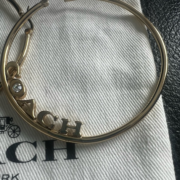 Coach Gold-Tone Logo Hoop Earrings - Picture 2 of 3